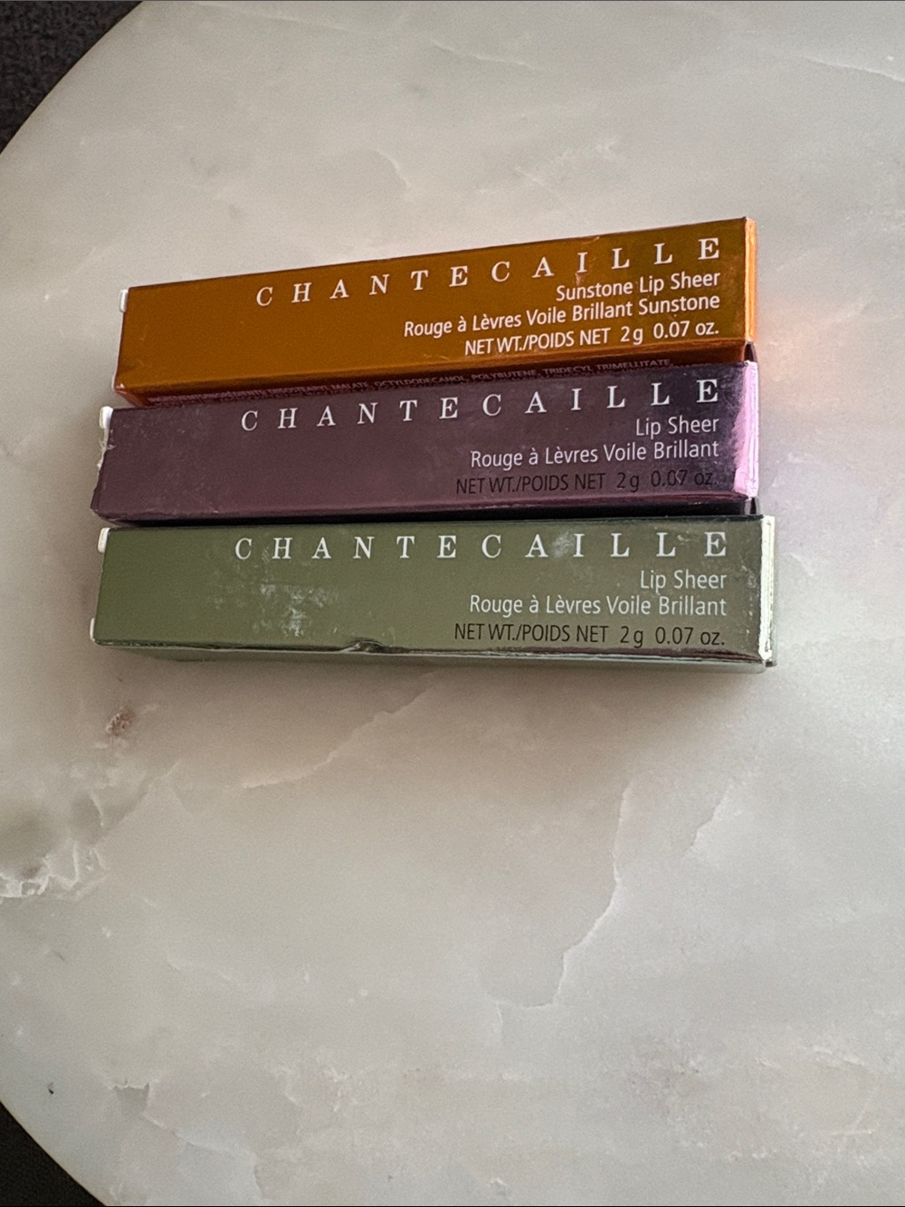 Chantecaille Lip Sheer Trio in MONARCH, ENTHUSIASM, and SWALLOWTAIL